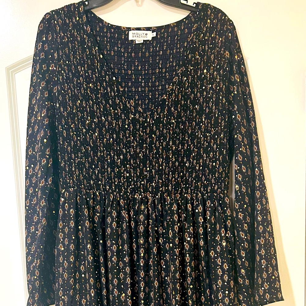 Molly bracken maxi dress
In new condition